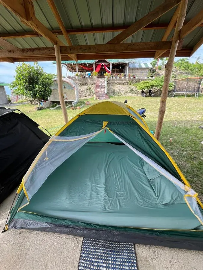 Tent under a shelter
